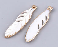 Gold rimmed feathers